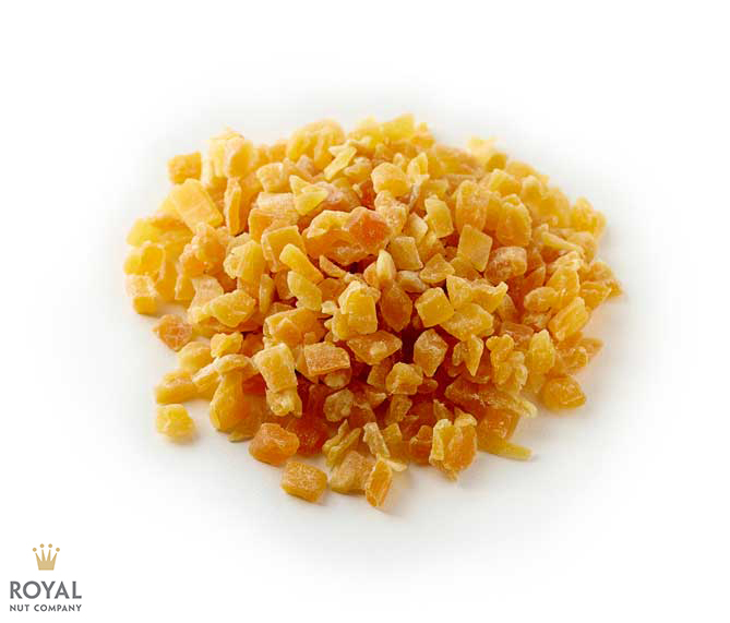 diced mango white background with a pile of yellow diced mango