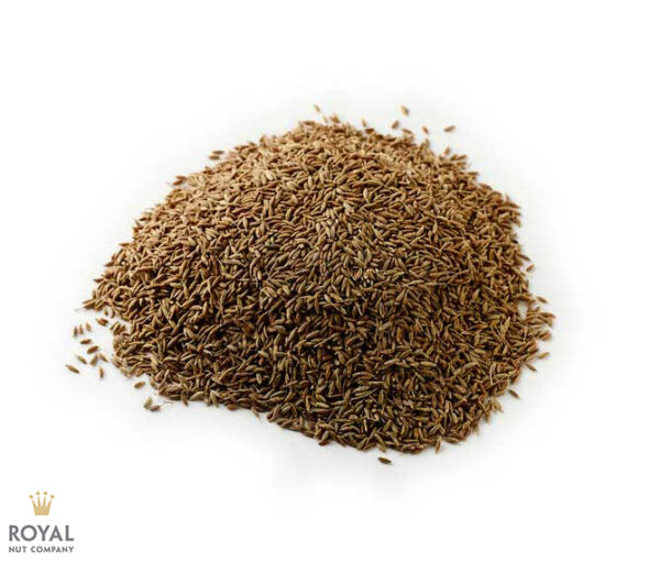 A group of cumin seeds on a white background