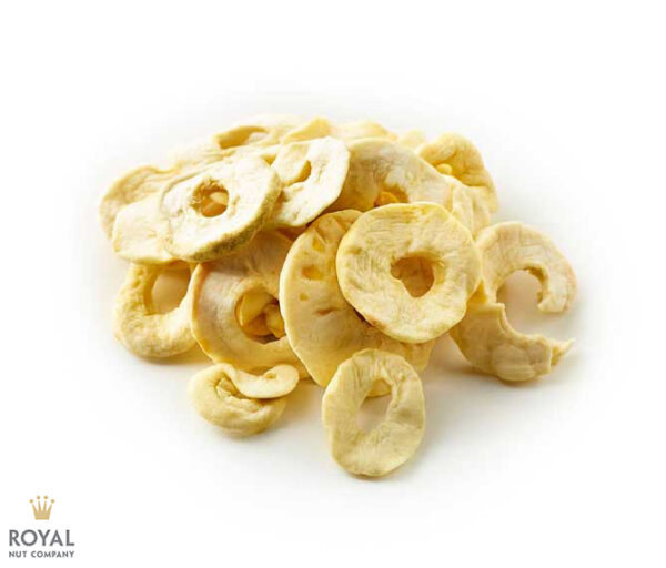 white background with a pile of yellow dried apple rings