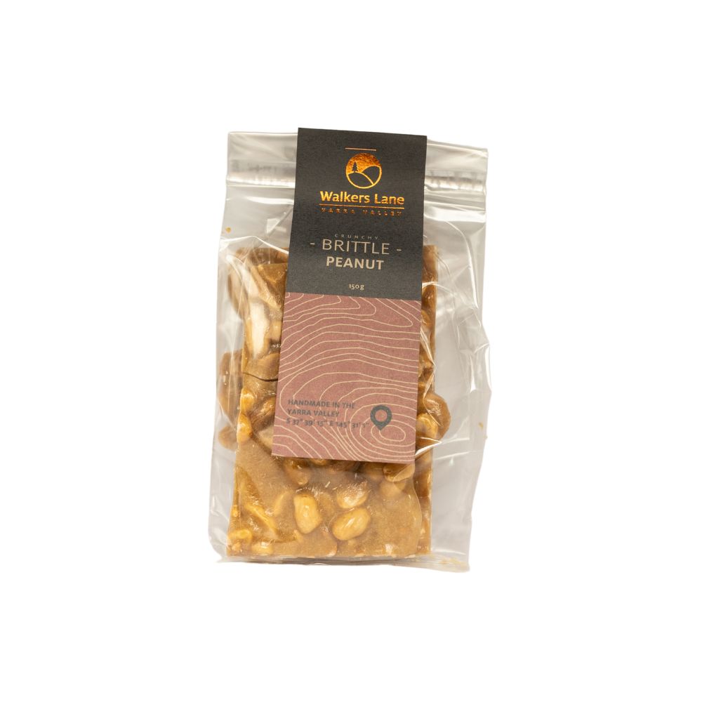 Peanut brittle A white background image with a bag of peanut brittle