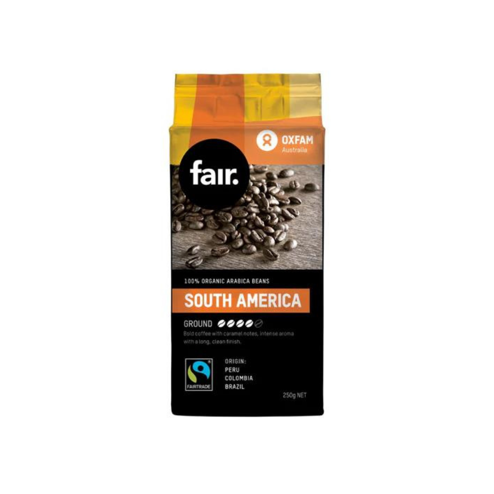 Organic arabica southamerican ground beans white background with n orange bag of Organic arabica southamerican ground beans