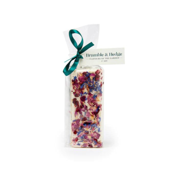 white background image with a Pomegranate & Sour Cherry & Belgian White Chocolate Nougat