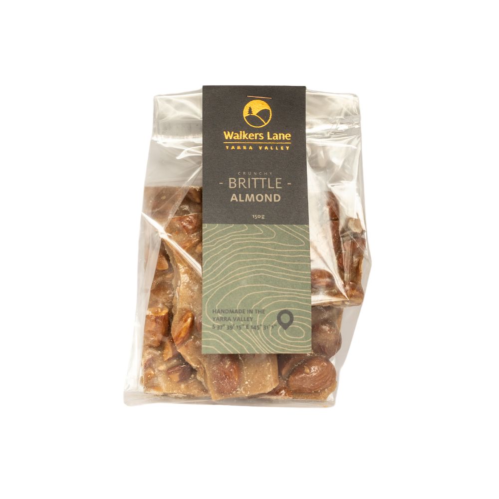 almond brittle A white background image with a bag of almond brittle