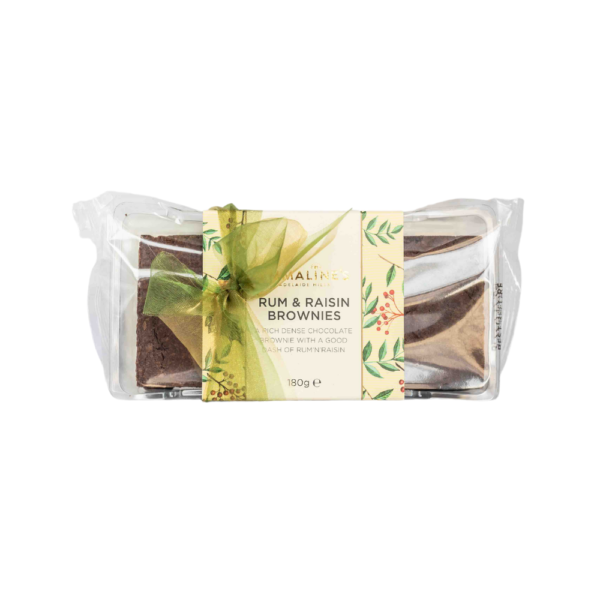 A white background image with a box of Emmaline's rom and raisin brownies
